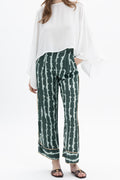 Pair of stylish MYT Print Pants with bold patterns, showcasing a comfortable fit and trendy design in a modern lookbook se...