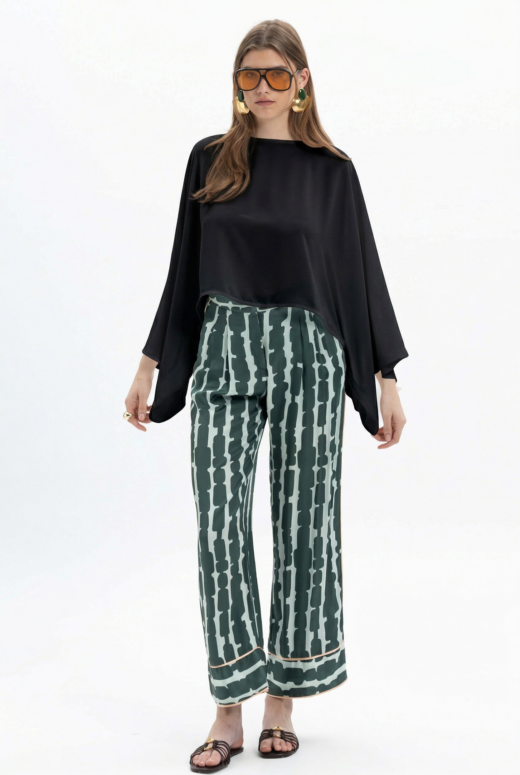 Recolor of MYT Batwing Blouse with wide sleeves in Nano Banana fabric, shown in close-up detail.