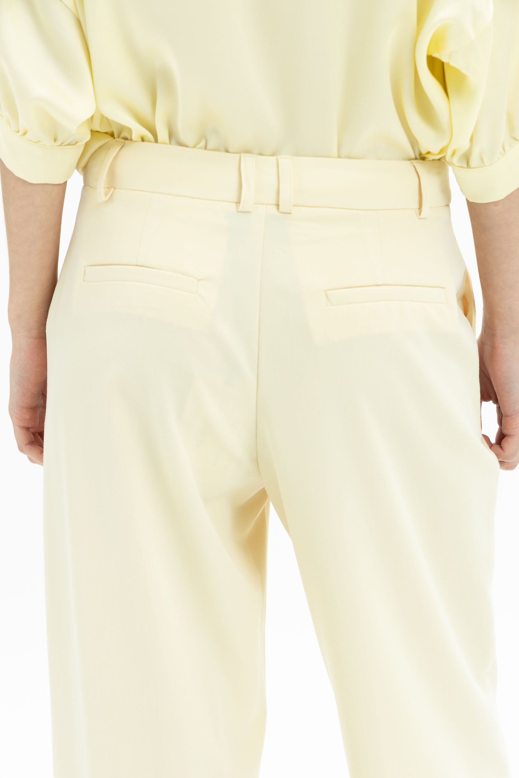 MYT wide leg pants in butter yellow paired with a matching blouson shirt, stylish women's casual outfit.