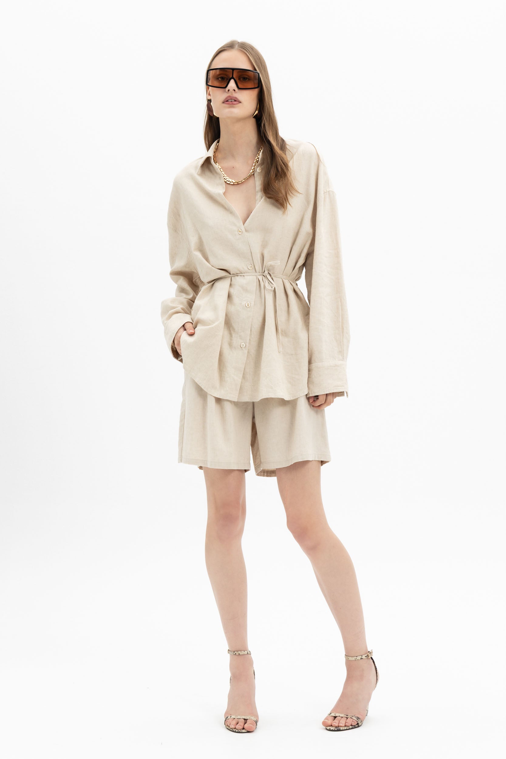 Sand beige linen belted shirt by MYT, long-sleeve design, shown as part of a casual women's shorts set.