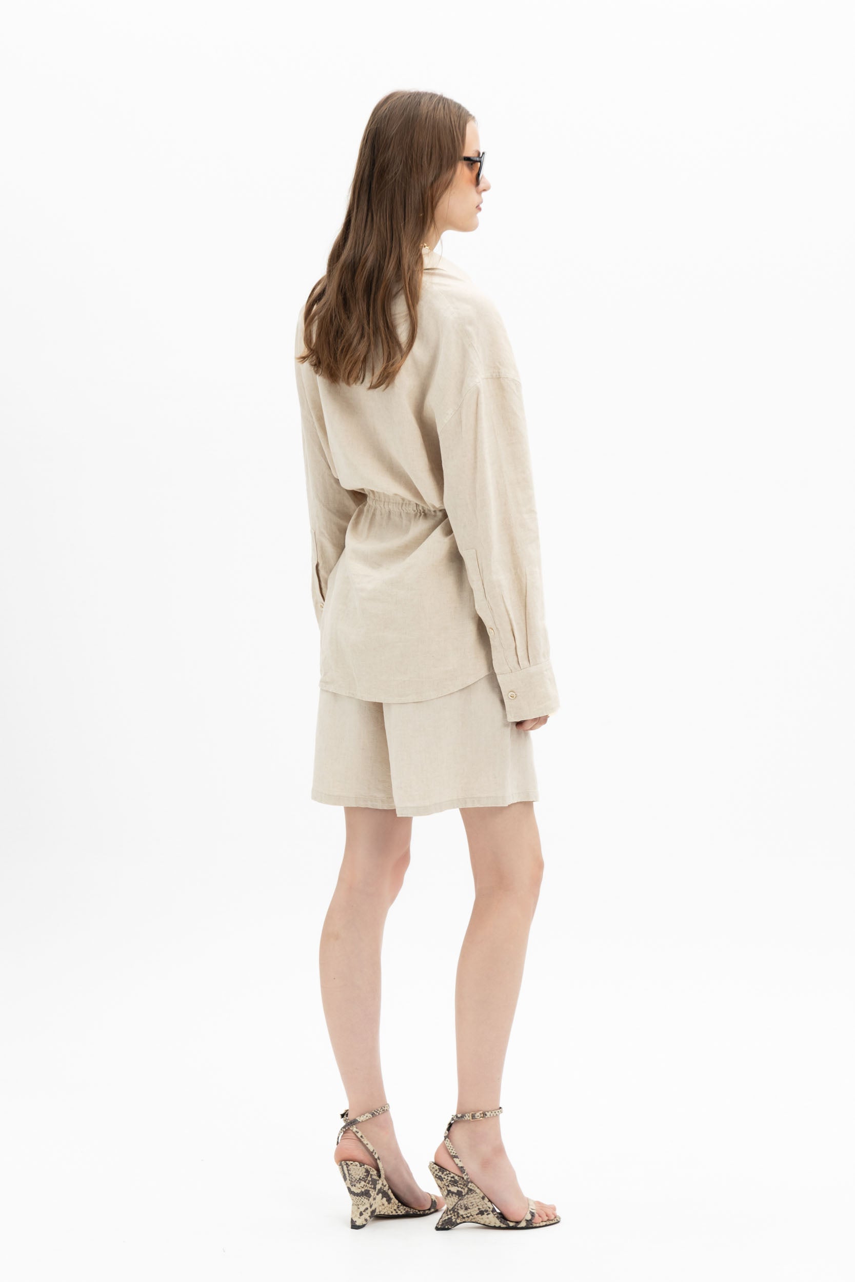 Sand beige linen belted shirt from MYT, long sleeve design with a matching shorts set for women.